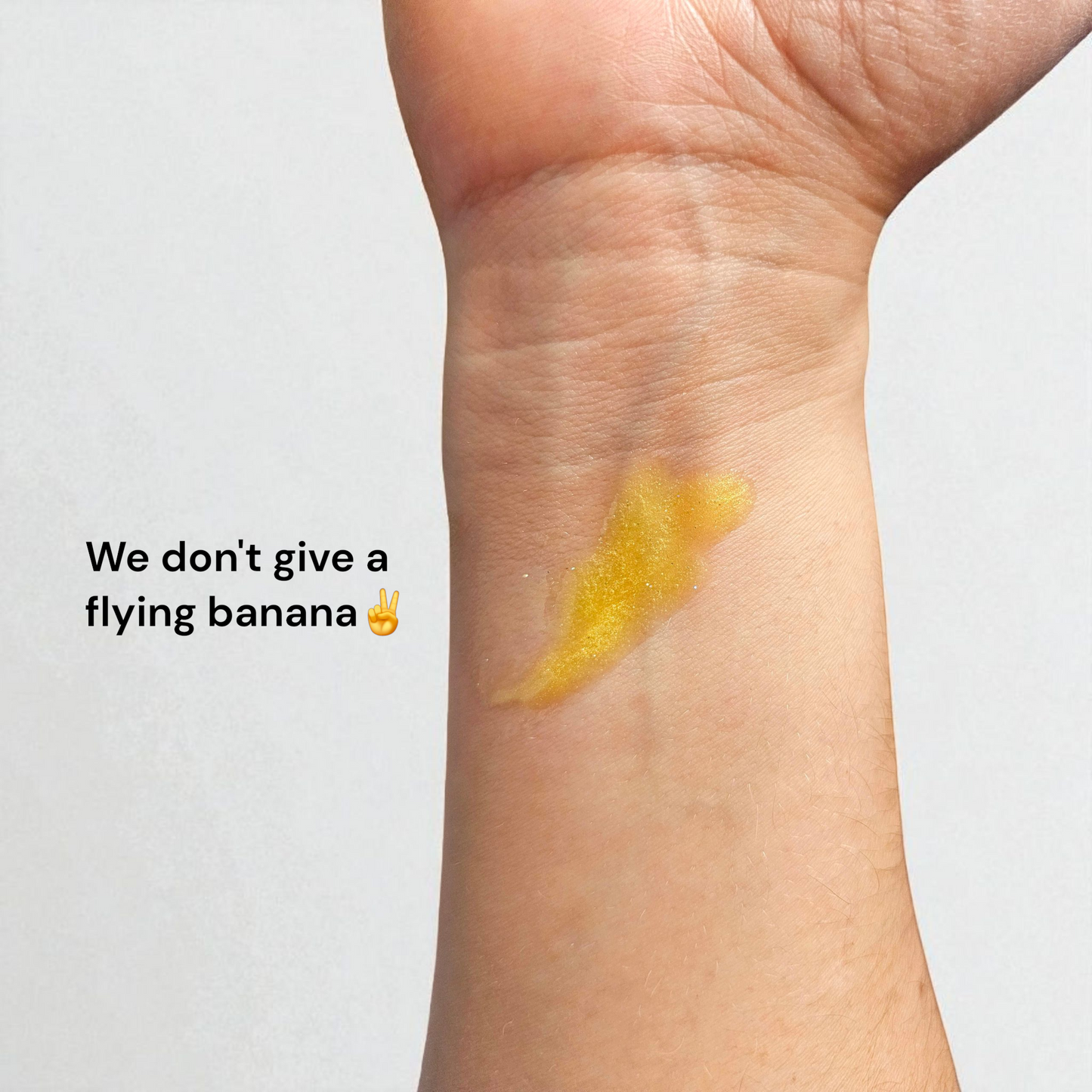 I DON'T GIVE A FLYING BANANA High Shine Lip Gloss (Light Yellow with Sparkle)